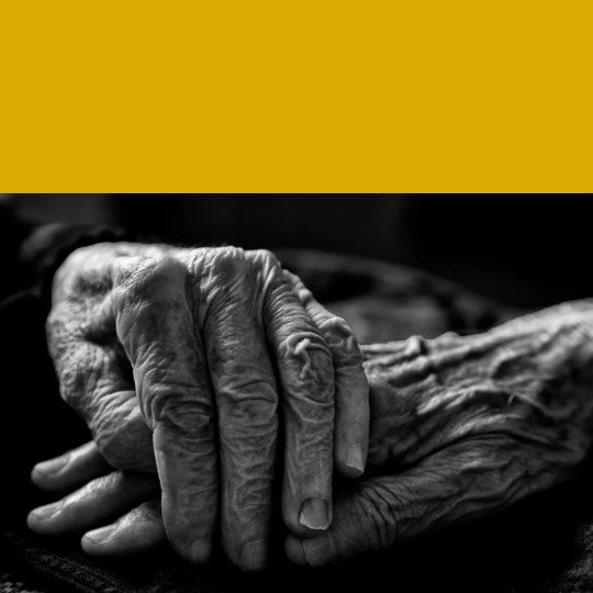 an old hands folded together