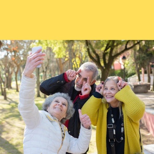 a group of people taking a selfie